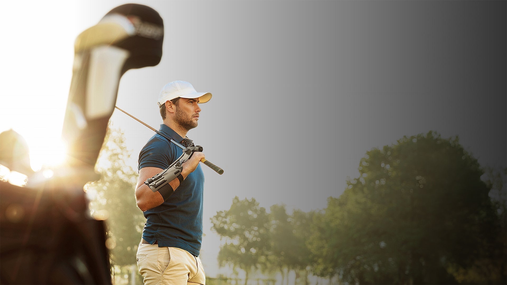 Golfer using the Precision Impact swing trainer for crisp, compressed impact